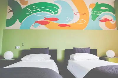Letto o letti in una camera di La Scivola Rooms