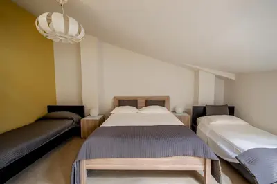 Letto o letti in una camera di La Scivola Rooms