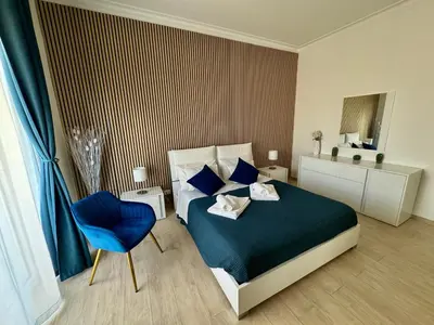Letto o letti in una camera di Gioeni Home