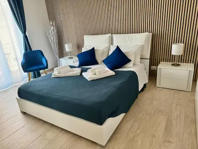 Letto o letti in una camera di Gioeni Home