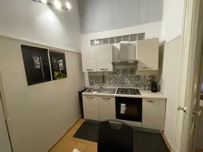 Cucina o angolo cottura di BOVIO PRESTIGE APARTMENTS CATANIA