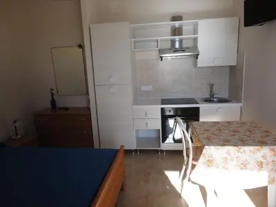 Cucina o angolo cottura di Acirealevacanze - Romantica Camera sul Mare