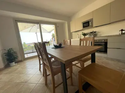 Cucina o angolo cottura di Maison de Cheeramie - Tourist Apartments Tra Mare e Etna