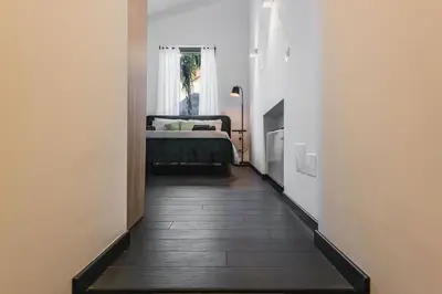 Letto o letti in una camera di Leone Apartment with Garden by Wonderful Italy