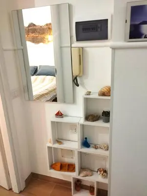 Letto o letti in una camera di Casa del Mare Acitrezza