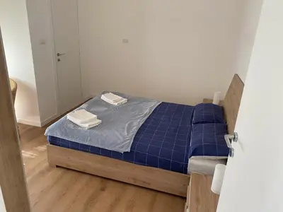 Letto o letti in una camera di CasaTua