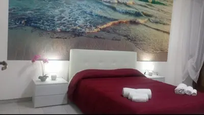 Letto o letti in una camera di Faraglioni inn