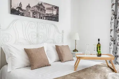 Letto o letti in una camera di Aulino House