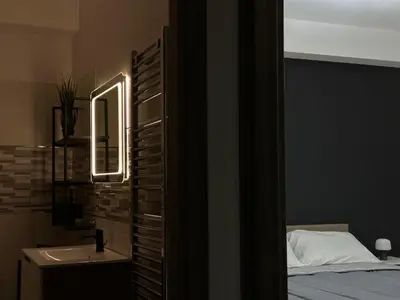 Letto o letti in una camera di Amour Içi Boutique Apartments in centro