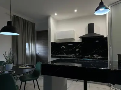 Cucina o angolo cottura di Amour Içi Boutique Apartments in centro