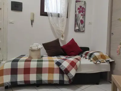 Letto o letti in una camera di La Maison di Giusy