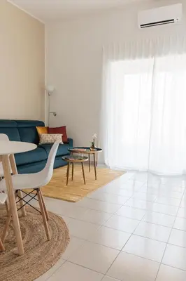 Area soggiorno di Giardina's Apartment Catania