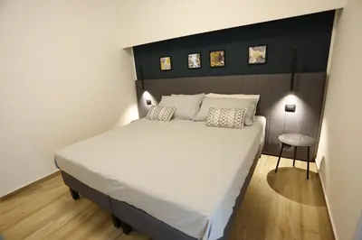 Letto o letti in una camera di Viscalori Homes