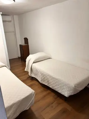 Letto o letti in una camera di Casa Maretna