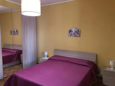 Letto o letti in una camera di Casa Francesco