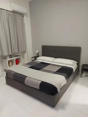 Letto o letti in una camera di Casa Galè - House in Catania Center
