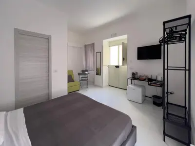 Letto o letti in una camera di Casa Galè - House in Catania Center