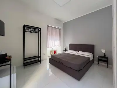 Letto o letti in una camera di Casa Galè - House in Catania Center