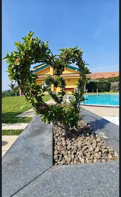 Piscina di Bright apartment in Acireale, 60 sqm with shared pool o nelle vicinanze