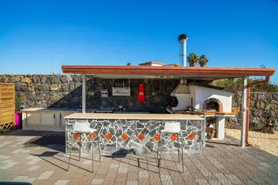 Balcone o terrazza di Bright apartment in Acireale, 60 sqm with shared pool