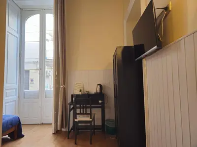 TV o dispositivi per l'intrattenimento presso Giardino Siciliano B&B