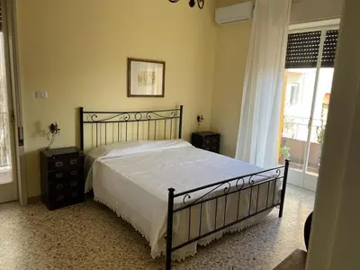 Letto o letti in una camera di appartamento donna Nica