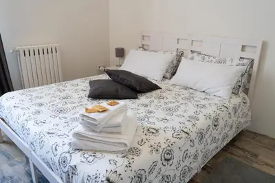 Letto o letti in una camera di Beneventano Apartment Catania