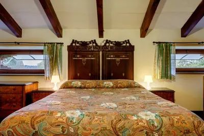 Letto o letti in una camera di Domus Vini