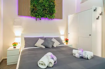 Letto o letti in una camera di Tropical Holiday House