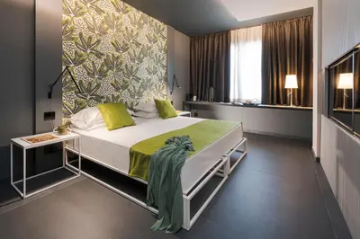 Letto o letti in una camera di Catania Smart Hotel
