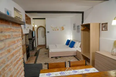 Letto o letti in una camera di R-HOME Li Cuti