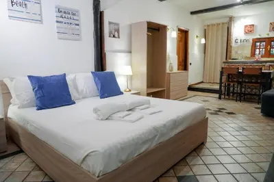 Letto o letti in una camera di R-HOME Li Cuti