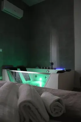 Letto o letti in una camera di IOLETTA HOUSE