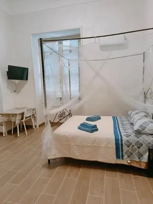 Letto o letti in una camera di Capuana House