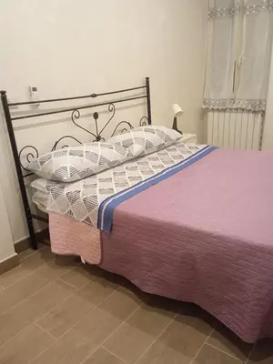 Letto o letti in una camera di Capuana House