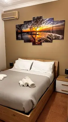 Letto o letti in una camera di Tiziana Sicily House