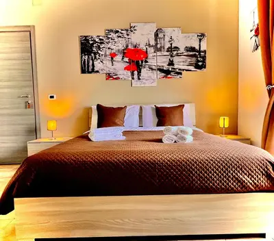 Letto o letti in una camera di Tiziana Sicily House