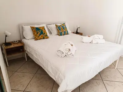 Letto o letti in una camera di The Rose of Etna guest house - Casa vacanze la Rosa dell'Etna