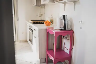 Cucina o angolo cottura di The Rose of Etna guest house - Casa vacanze la Rosa dell'Etna