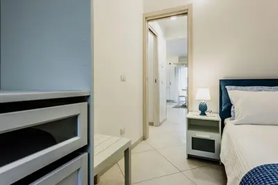 Letto o letti in una camera di Il Giardino di Aci by Wonderful Italy