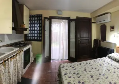Letto o letti in una camera di Mamma Etna