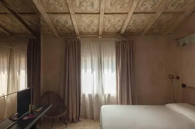 Letto o letti in una camera di ELLE dimora di Sicilia