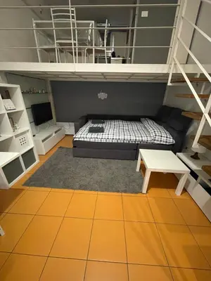 Letto o letti in una camera di Milo-metro Loft