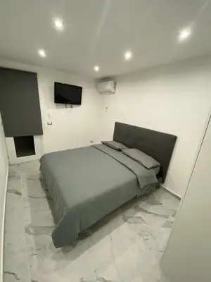 Letto o letti in una camera di Carlant Apartment