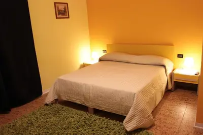 Letto o letti in una camera di B&B Fiori di Lava