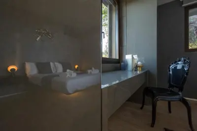 Letto o letti in una camera di Rahal Etna Luxury Retreat- Private Heated Jacuzzi 98F & Infinity Pool