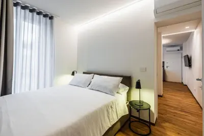 Letto o letti in una camera di Ferrini Home - Firenze 70