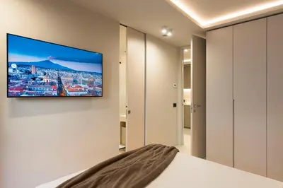 TV o dispositivi per l'intrattenimento presso Aera Suites 303-304-305