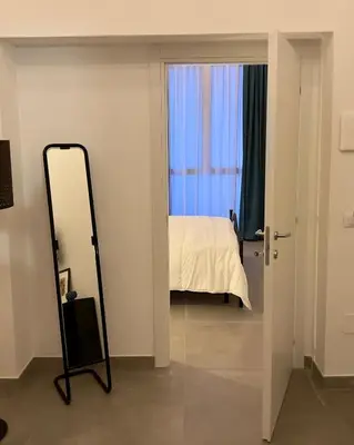 Letto o letti in una camera di GrotteBianche - Sicilian Apartment