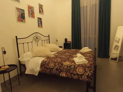 Letto o letti in una camera di GrotteBianche - Sicilian Apartment